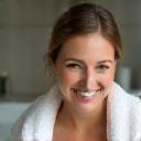 Happy customer Samantha with a towel by her tub